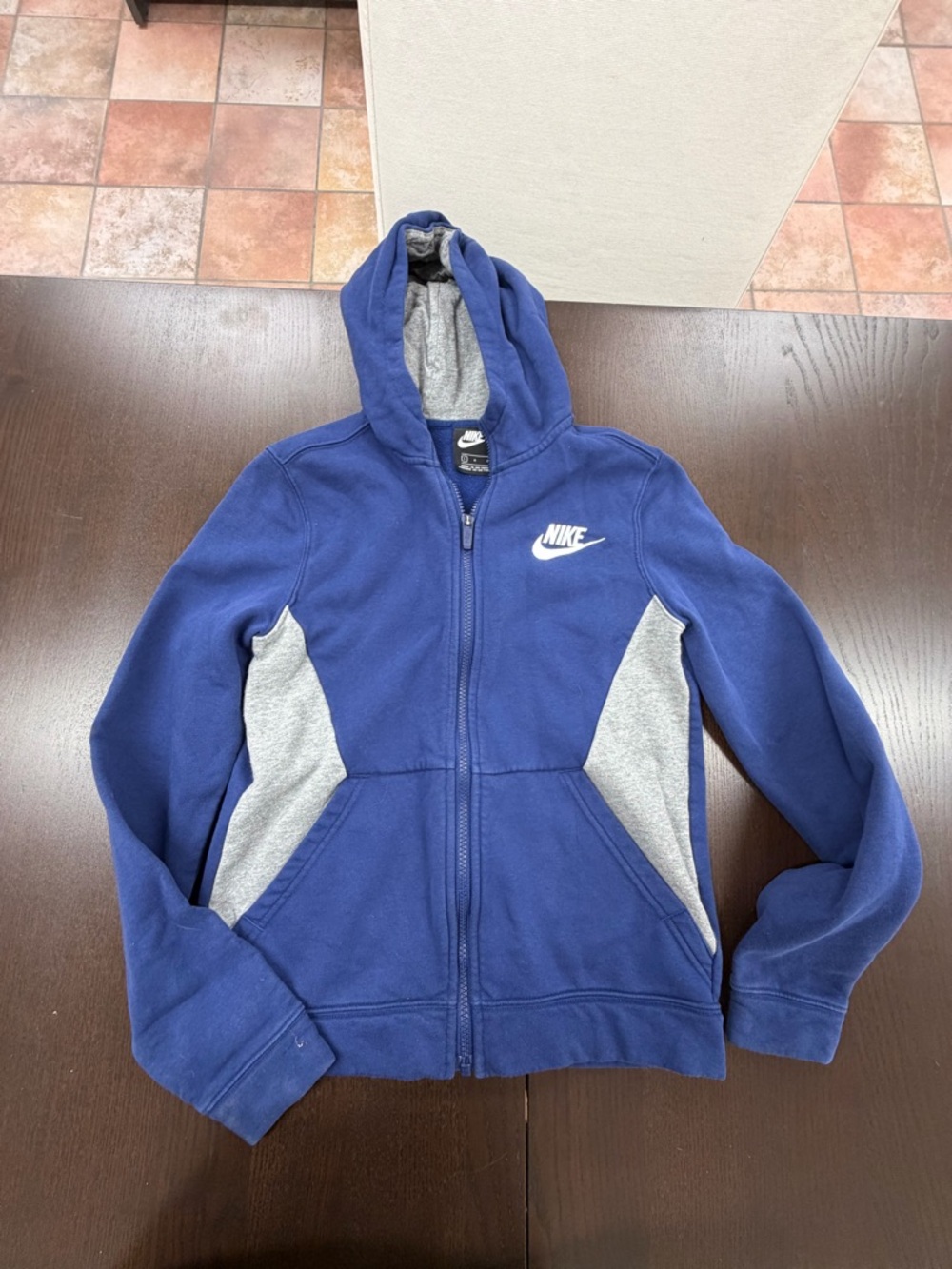 One size youth large Nike zip up jacket